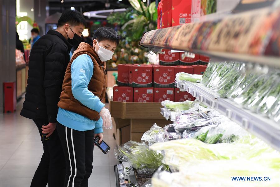 CHINA-BEIJING-NOVEL CORONAVIRUS-STAFF-SHARING (CN)