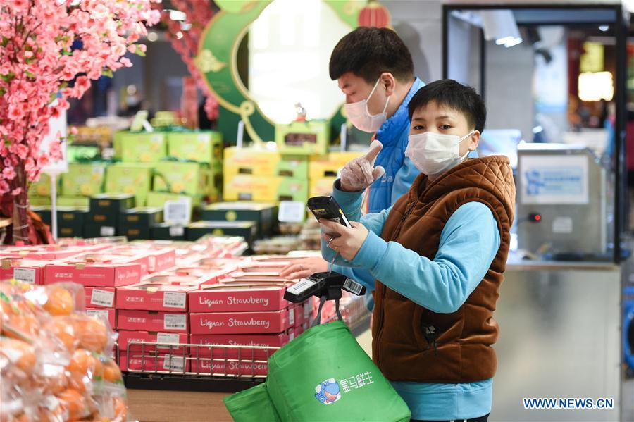 CHINA-BEIJING-NOVEL CORONAVIRUS-STAFF-SHARING (CN)