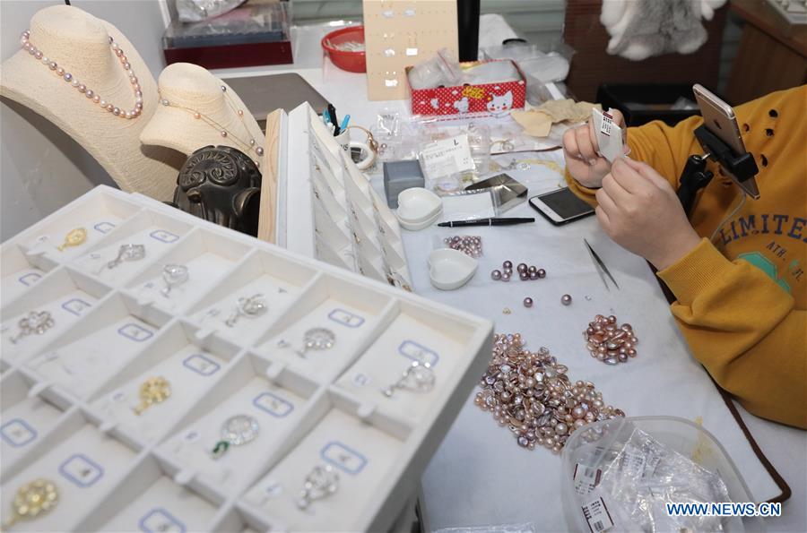 #CHINA-ZHEJIANG-PEARL SAIL ONLINE-RISE (CN)