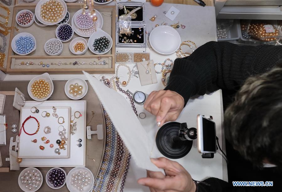 #CHINA-ZHEJIANG-PEARL SAIL ONLINE-RISE (CN)