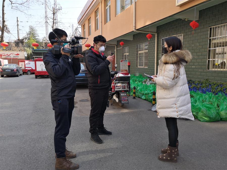 CHINA-HUBEI-NOVEL CORONAVIRUS-XINHUA-JOURNALISTS (CN)