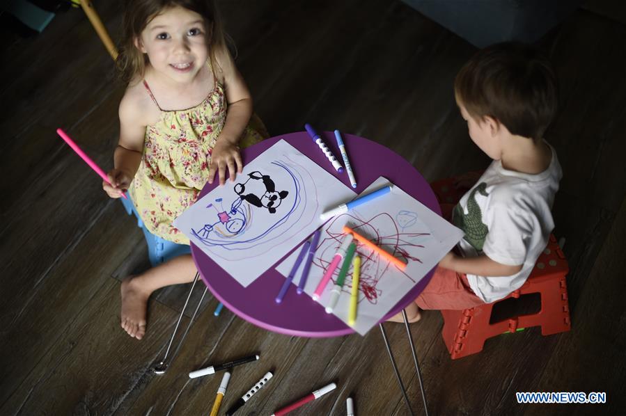 URUGUAY-MONTEVIDEO-GIRL-CHINA-CORONAVIRUS-SUPPORT