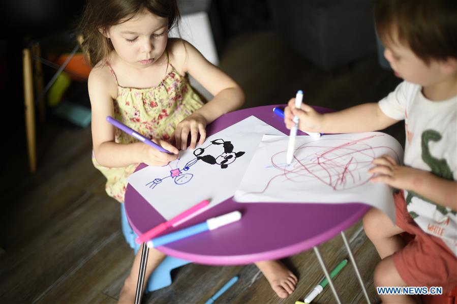 URUGUAY-MONTEVIDEO-GIRL-CHINA-CORONAVIRUS-SUPPORT