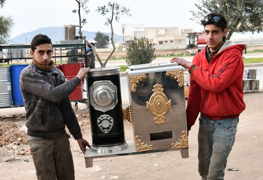 Pistachio shells replace heating fuel during winter in Syria's Hama