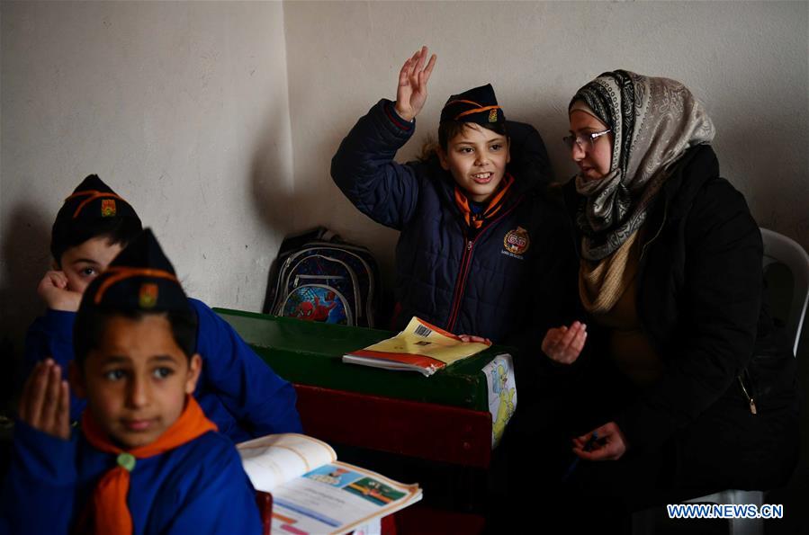 SYRIA-HOMS-AUTISTIC-BOY