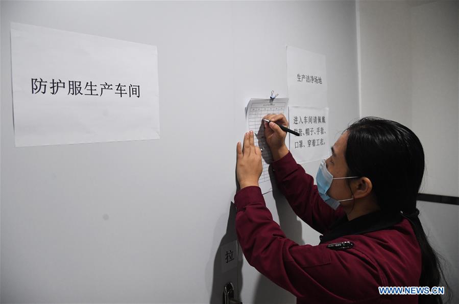 CHINA-BEIJING-COMPANY-TRANSFORMATION-PROTECTIVE SUIT PRODUCTION (CN)