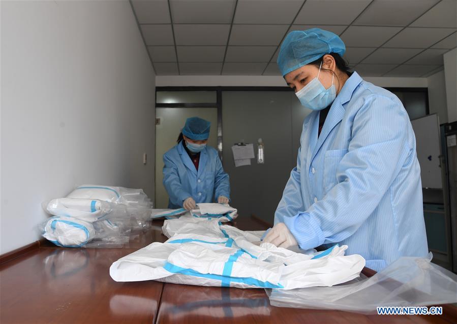 CHINA-BEIJING-COMPANY-TRANSFORMATION-PROTECTIVE SUIT PRODUCTION (CN)