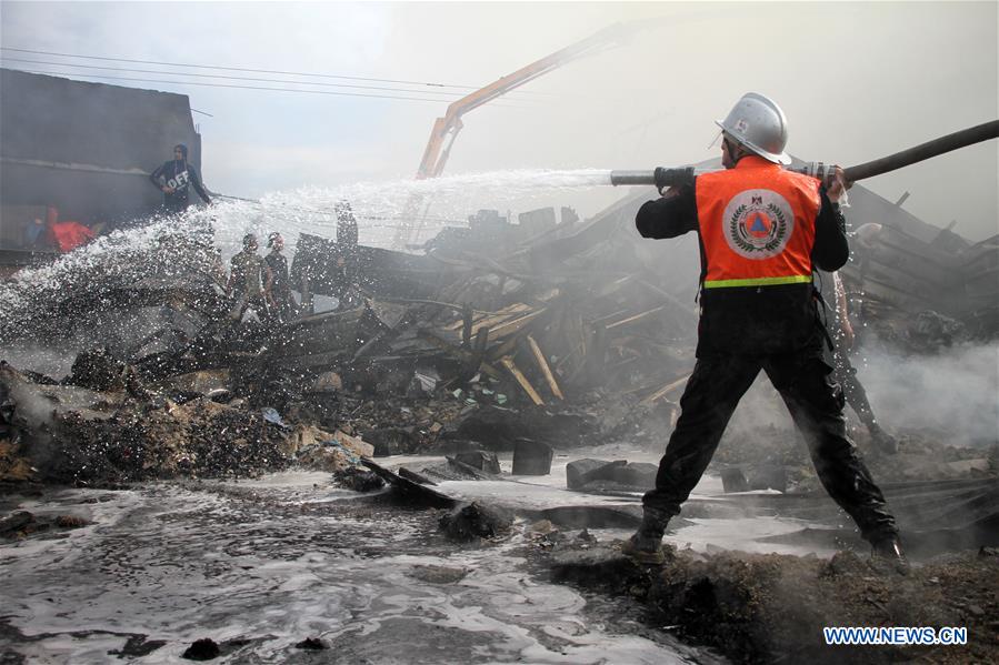 MIDEAST-GAZA-REFUGEE CAMP-FIRE