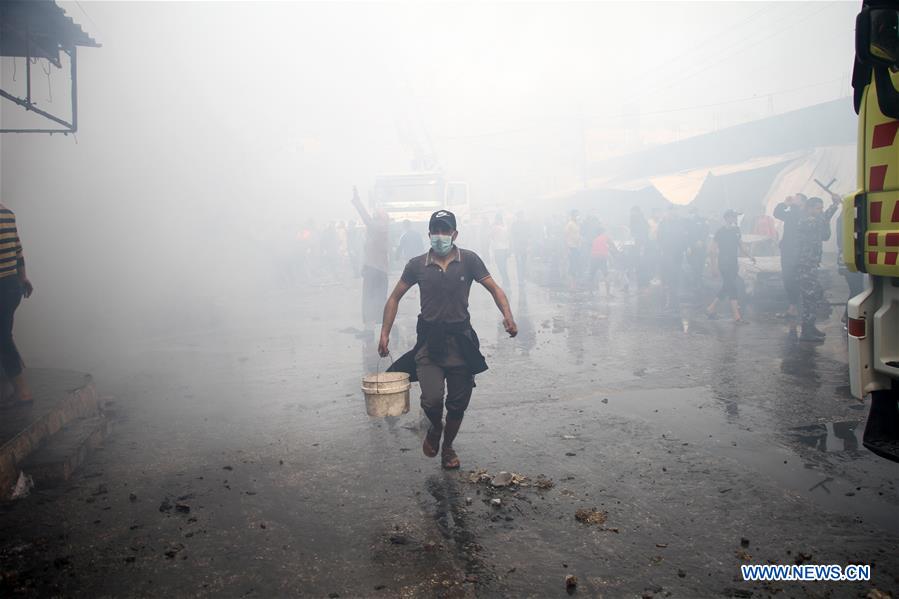 MIDEAST-GAZA-REFUGEE CAMP-FIRE