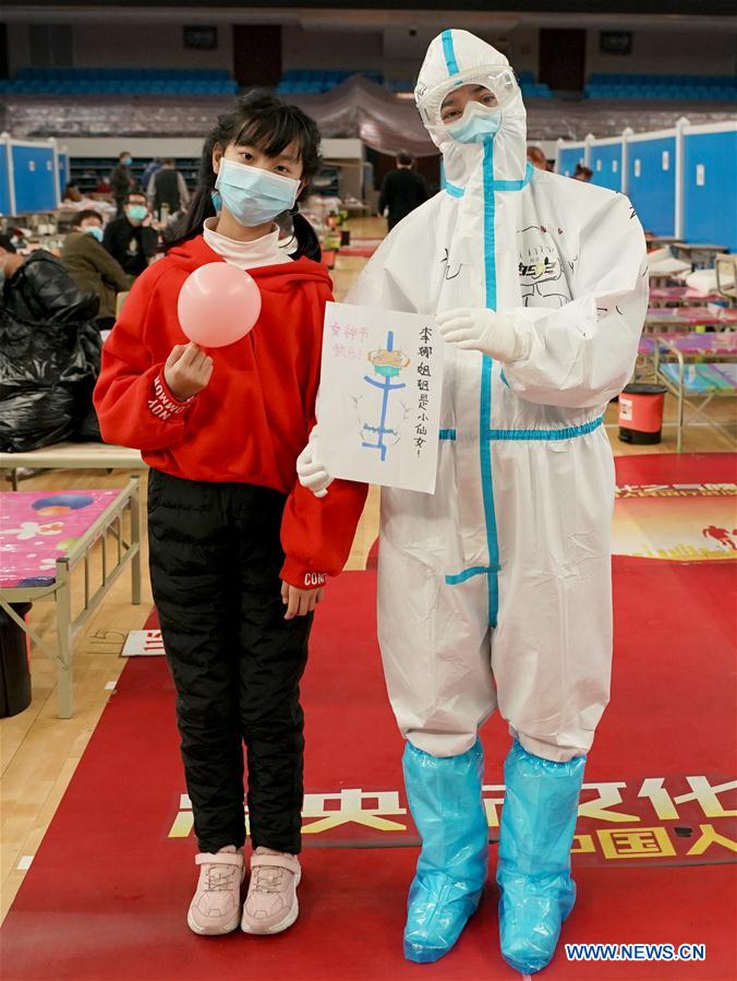 CHINA-HUBEI-WUHAN-MAKESHIFT HOSPITAL-WOMEN'S DAY-PAINTING (CN)