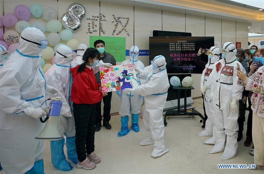 CHINA-HUBEI-WUHAN-MAKESHIFT HOSPITAL-WOMEN'S DAY-PAINTING (CN)
