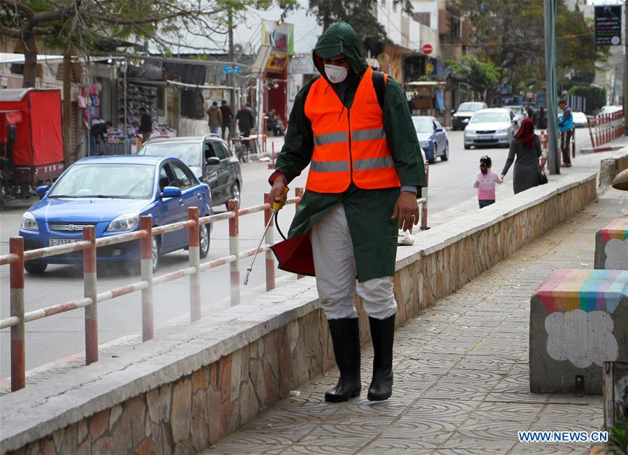 MIDEAST-GAZA-COVID-19-DISINFECTION