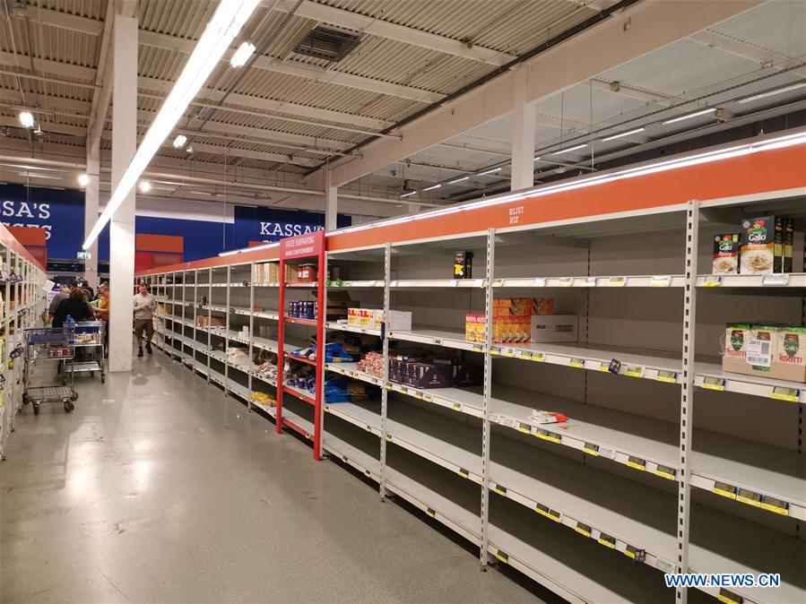 BELGIUM-BRUSSELS-COVID-19-SUPERMARKET-STOCKPILING