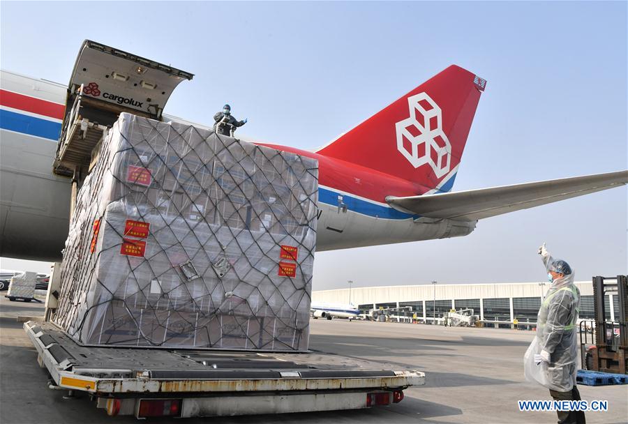 CHINA-HENAN-COVID-19-LUXEMBOURG-DONATED MATERIALS-DEPARTURE (CN)