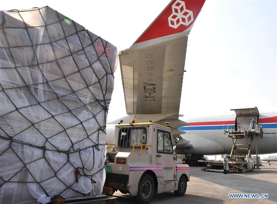 CHINA-HENAN-COVID-19-LUXEMBOURG-DONATED MATERIALS-DEPARTURE (CN)