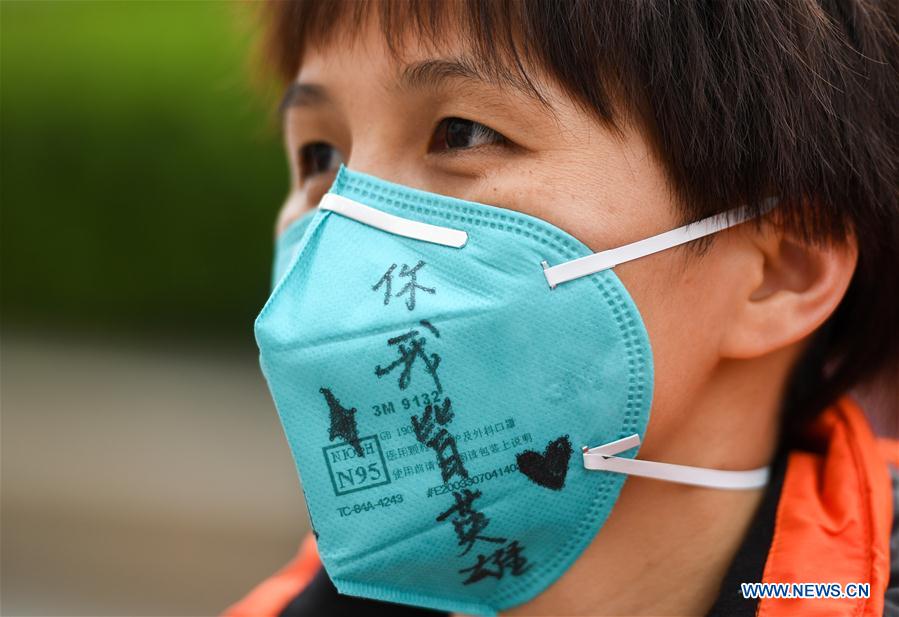 CHINA-HUBEI-WUHAN-MEDICAL STAFF FROM GUANGDONG-FAREWELL-FACE MASKS (CN)