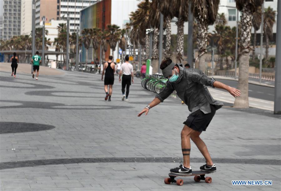 MIDEAST-TEL AVIV-COVID-19