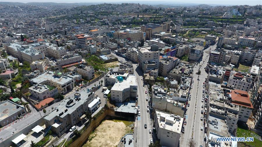 MIDEAST-HEBRON-COVID-19 