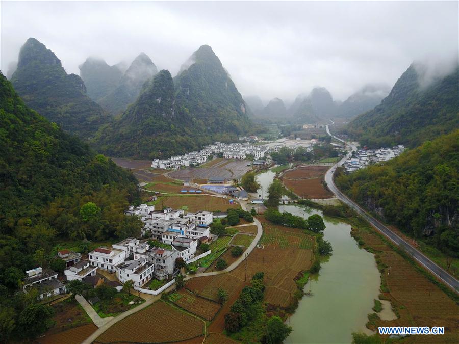 CHINA-GUANGXI-POVERTY RELIEF INDUSTRIES-DEVELOPMENT (CN)