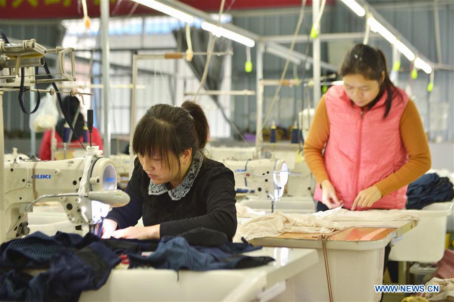 CHINA-GUANGXI-POVERTY RELIEF INDUSTRIES-DEVELOPMENT (CN)