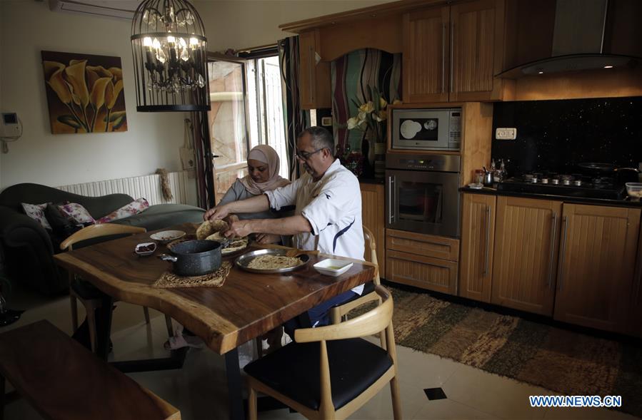 MIDEAST-NABLUS-COVID-19