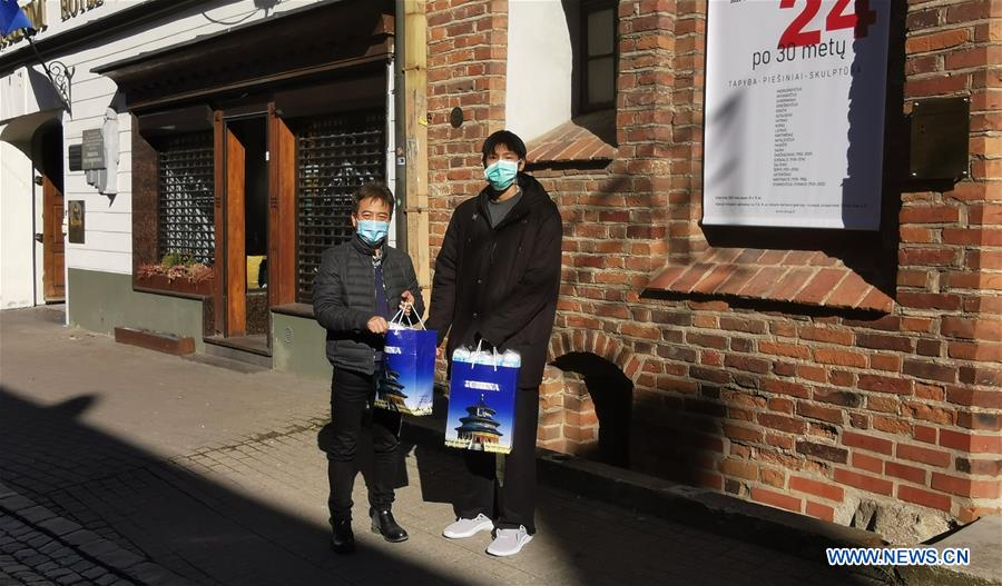 LITHUANIA-VILNIUS-COVID-19-CHINA-OVERSEAS STUDENTS-MASKS