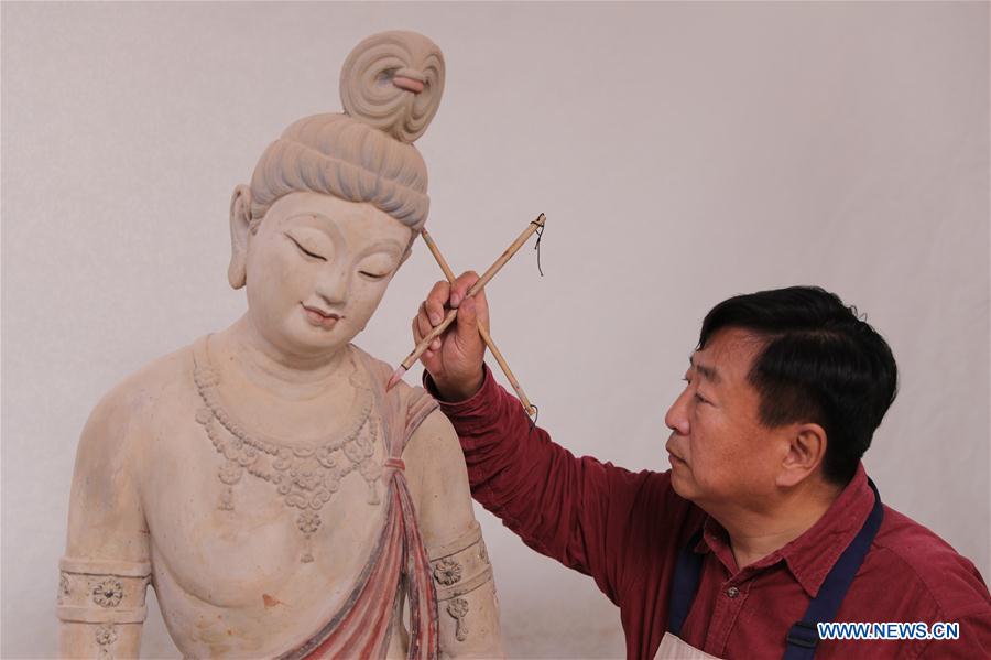 CHINA-GANSU-DUNHUANG-PAINTED SCULPTURE ART (CN)