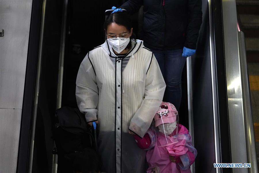 CHINA-BEIJING-TRAIN FROM WUHAN-ARRIVAL (CN) 