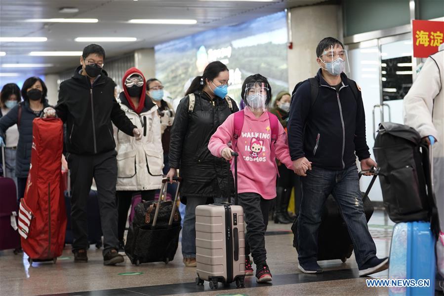 CHINA-BEIJING-TRAIN FROM WUHAN-ARRIVAL (CN) 