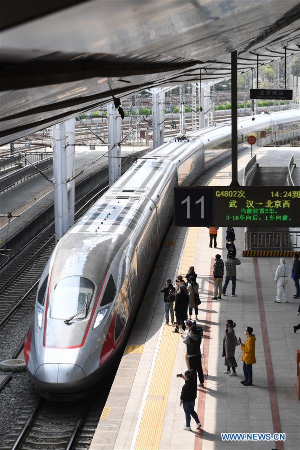 CHINA-BEIJING-TRAIN FROM WUHAN-ARRIVAL (CN) 