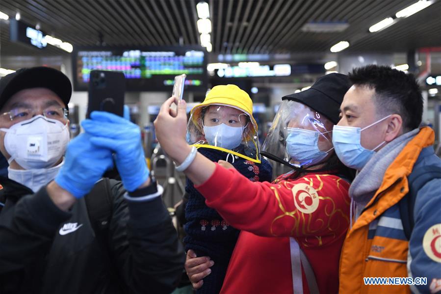 CHINA-BEIJING-TRAIN FROM WUHAN-ARRIVAL (CN) 
