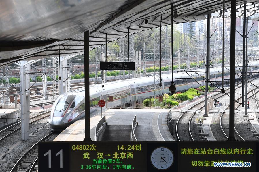 CHINA-BEIJING-TRAIN FROM WUHAN-ARRIVAL (CN) 