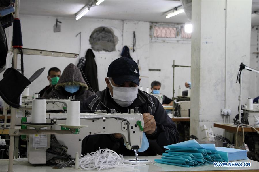 MIDEAST-GAZA-COVID-19-MASK