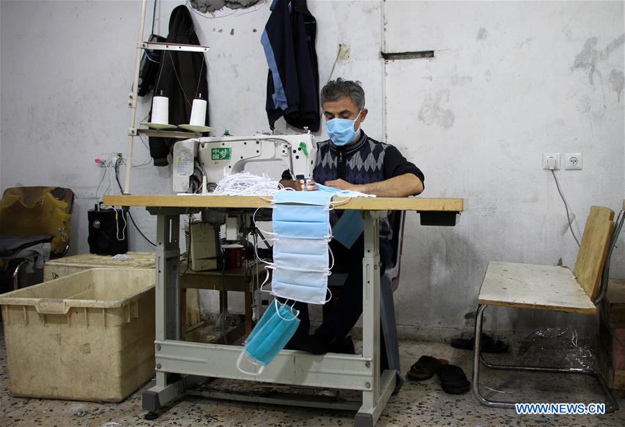 MIDEAST-GAZA-COVID-19-MASK