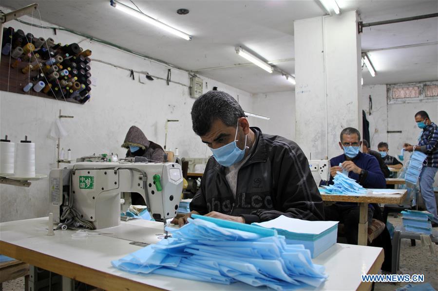 MIDEAST-GAZA-COVID-19-MASK