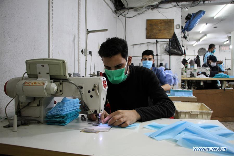 MIDEAST-GAZA-COVID-19-MASK