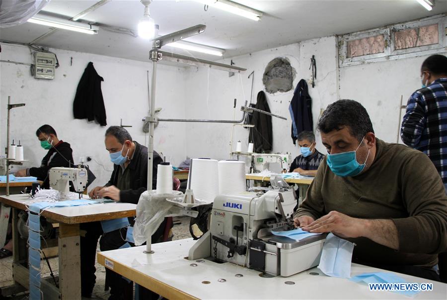 MIDEAST-GAZA-COVID-19-MASK