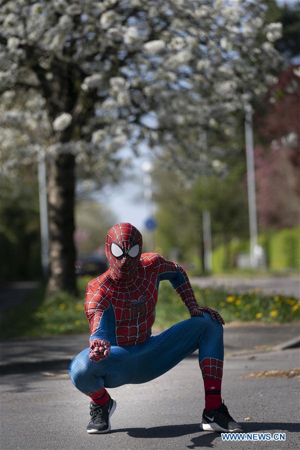 BRITAIN-MANCHESTER-COVID-19-SPIDER-MAN