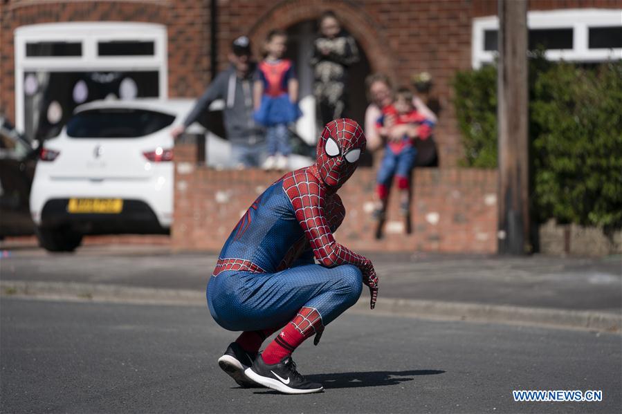 BRITAIN-MANCHESTER-COVID-19-SPIDER-MAN