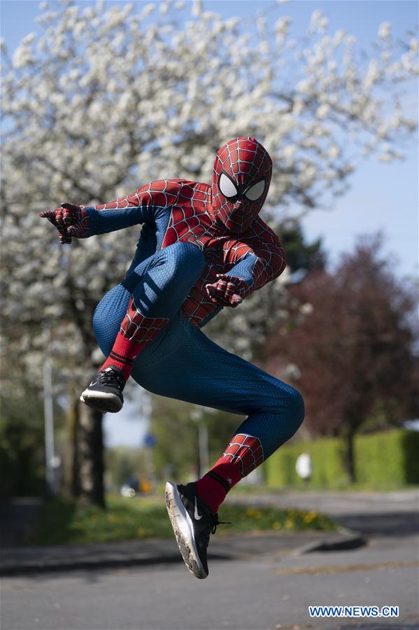 BRITAIN-MANCHESTER-COVID-19-SPIDER-MAN