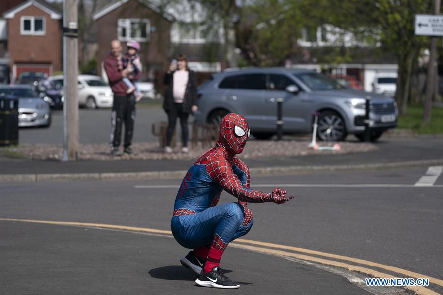 BRITAIN-MANCHESTER-COVID-19-SPIDER-MAN