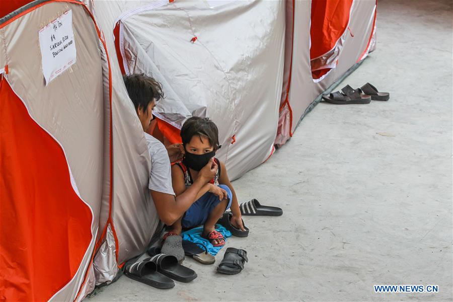 PHILIPPINES-MANILA-SLUM AREA-FIRE-TENTS