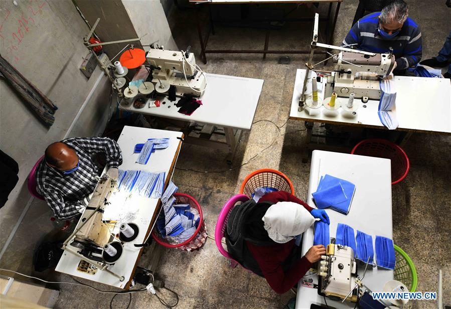 SYRIA-DAMASCUS-MASKS-OVERALLS-MEDICAL-MAKING