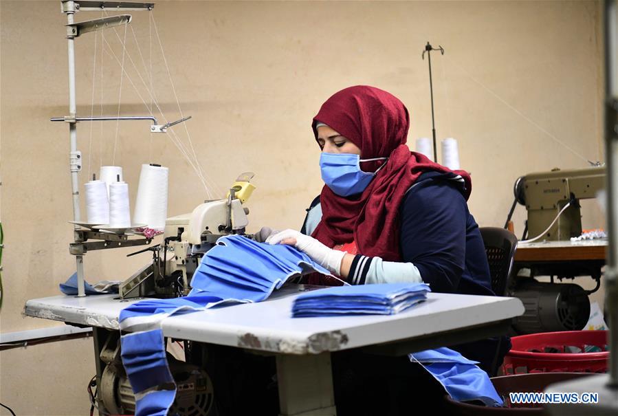 SYRIA-DAMASCUS-MASKS-OVERALLS-MEDICAL-MAKING