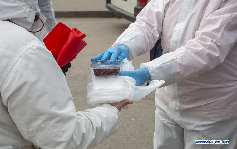 LATVIA-OGRE-COVID-19-FOOD DELIVERY