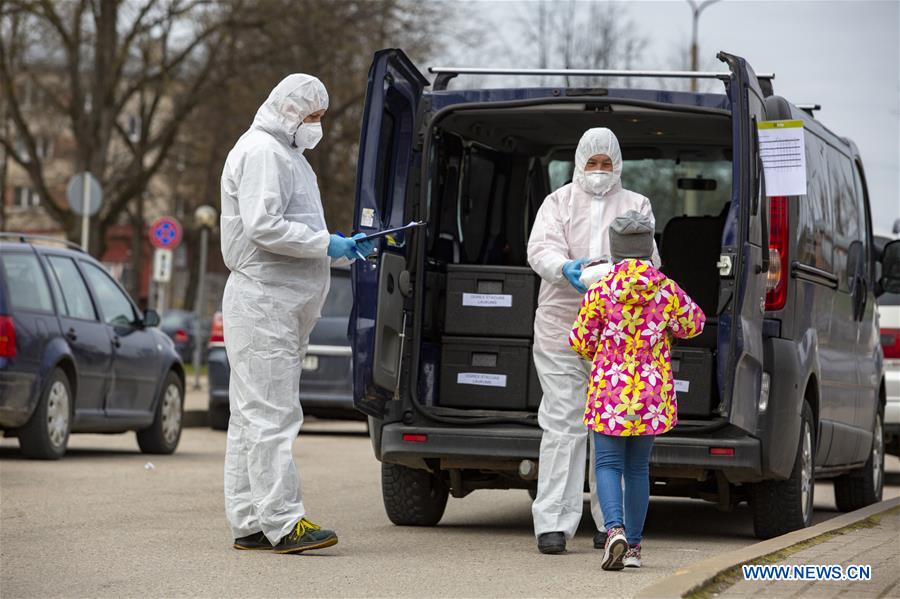 LATVIA-OGRE-COVID-19-FOOD DELIVERY