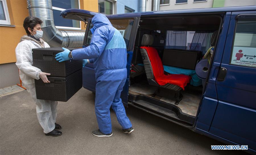 LATVIA-OGRE-COVID-19-FOOD DELIVERY