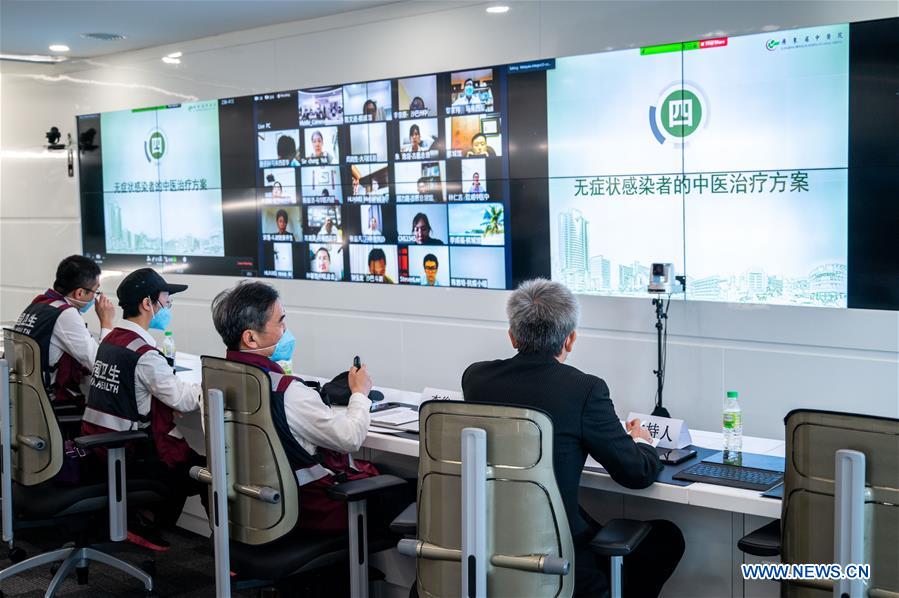 Chinese expert team holds discussions with Malaysian practitioners on