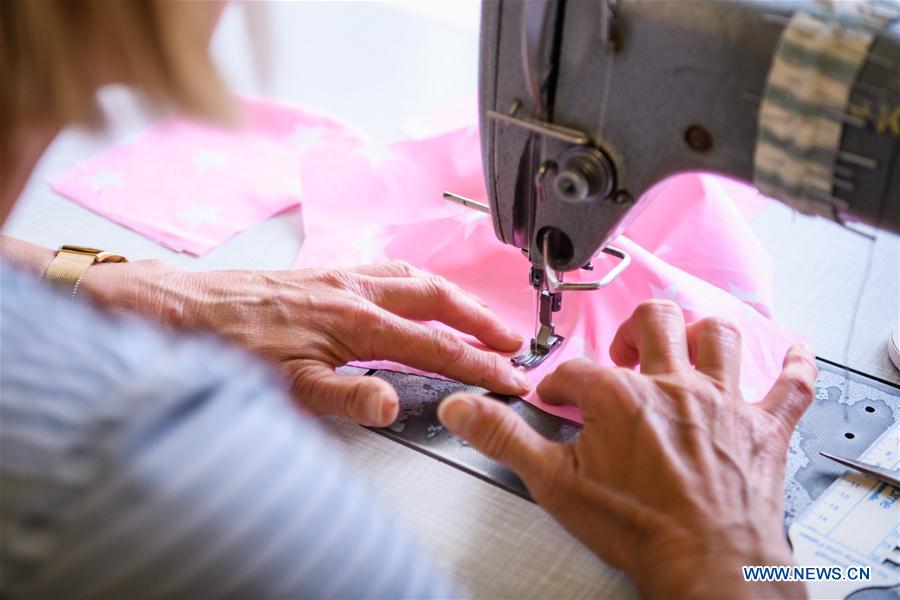 GERMANY-TRAUNSTEIN-COVID-19-TAILOR-SELF-MADE FACE MASKS
