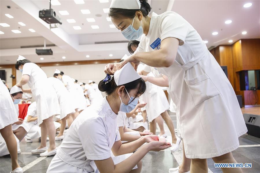 Newly Recruited Nurses Attend Capping Ceremony in Beijing